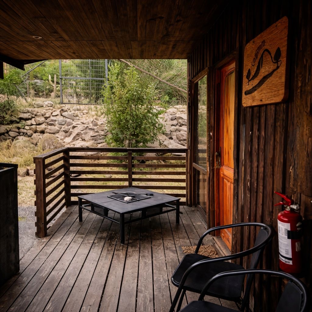 Covered wooden terrace of the Rustic cabin