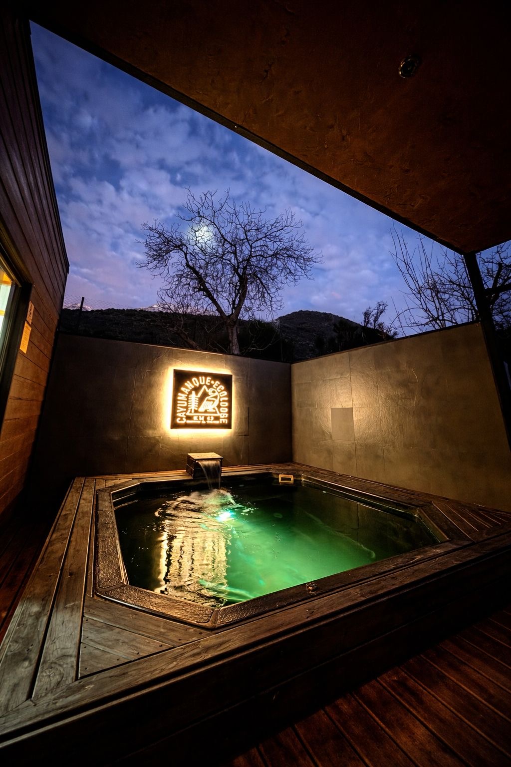 Suite jacuzzi pool illuminated at dusk